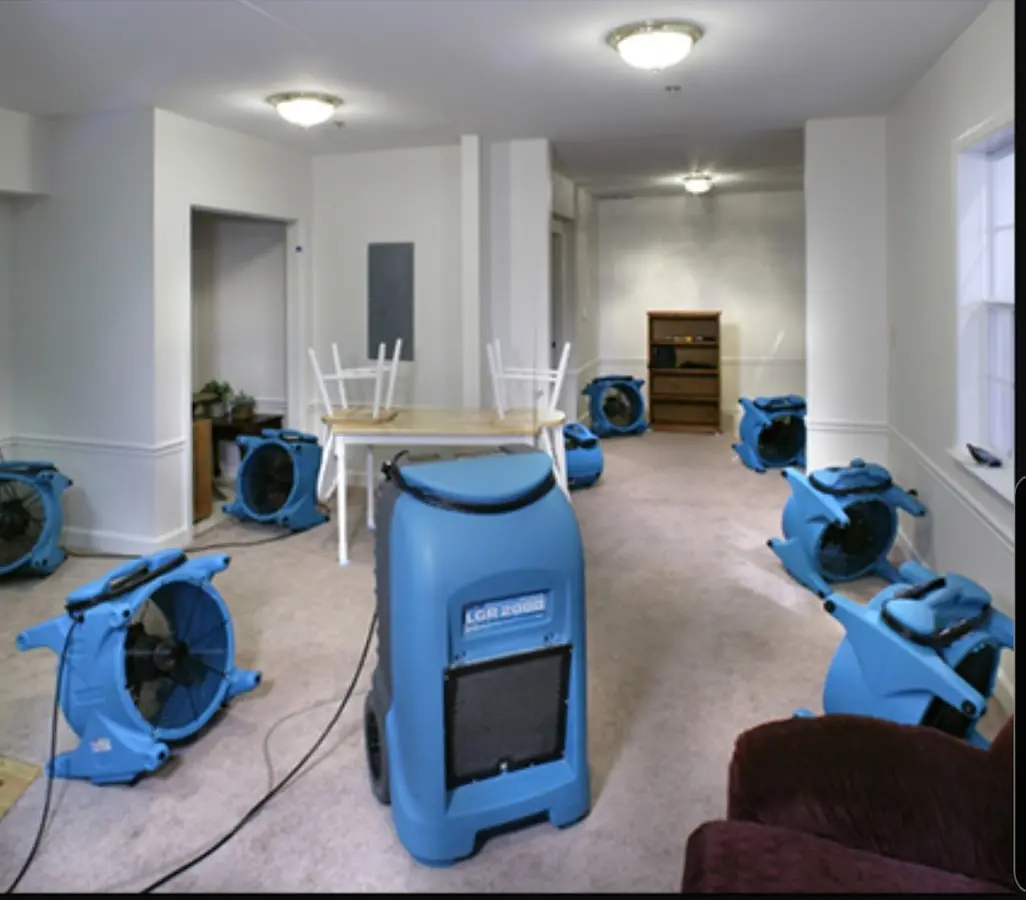 Air movers and dehumidifier setup for Water Damage Restoration in Terrell